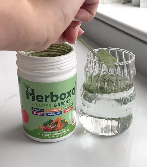 Peach-flavored Herboxa Super Greens supplement for alkalizing, antioxidant boost, and overall wellness.
